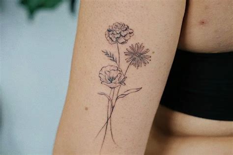 august and may birth flower tattoo|More.